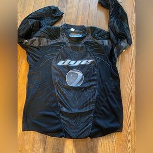 TWO GOALIE  JERSEYS IN GREAT CONDITION.  ONE RED-MEDIUM AND ONE BLACK-LARGE